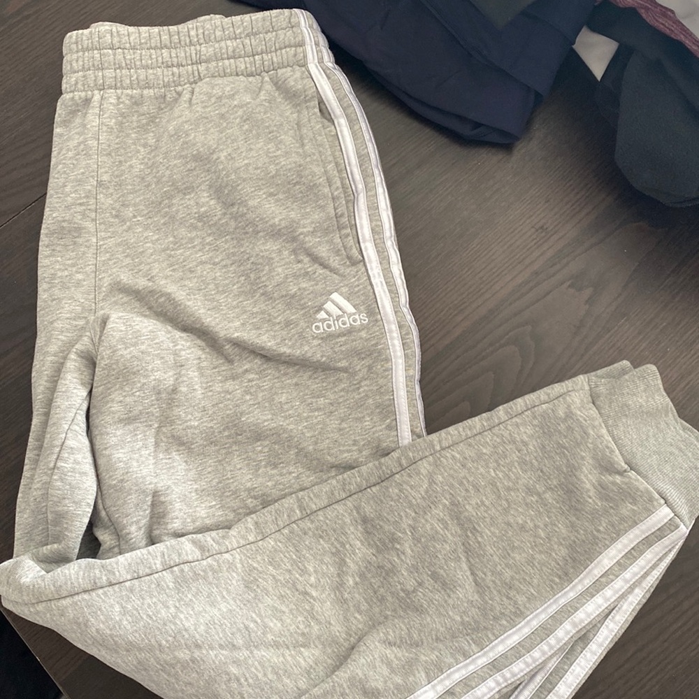 Adidas sweatpants.